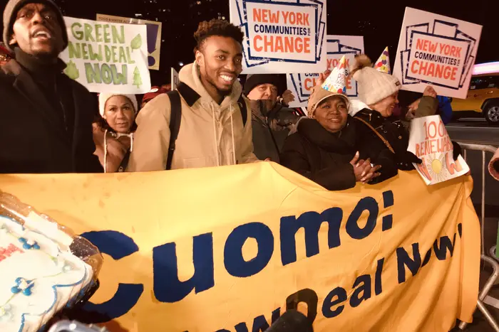 Climate crisis protesters rally outside a fundraiser for Governor Andrew Cuomo.
